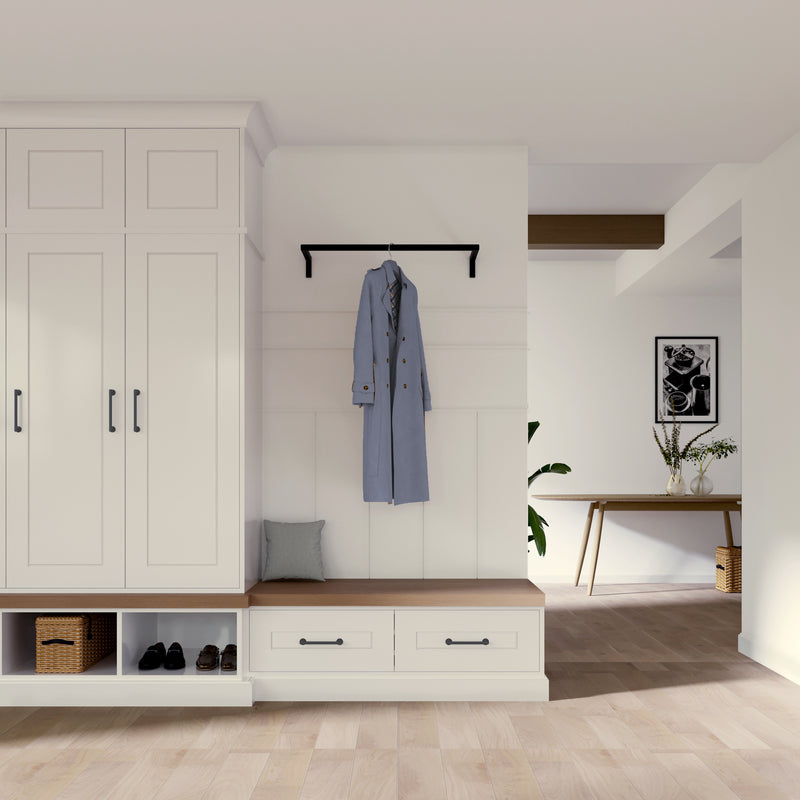 wall mounted clothes rail for simple wardrobe in the entrance area made from black iron pipes