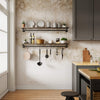 wall mounted iron rail close to the wall with small shelf on top to hang kitchen utensils in reach