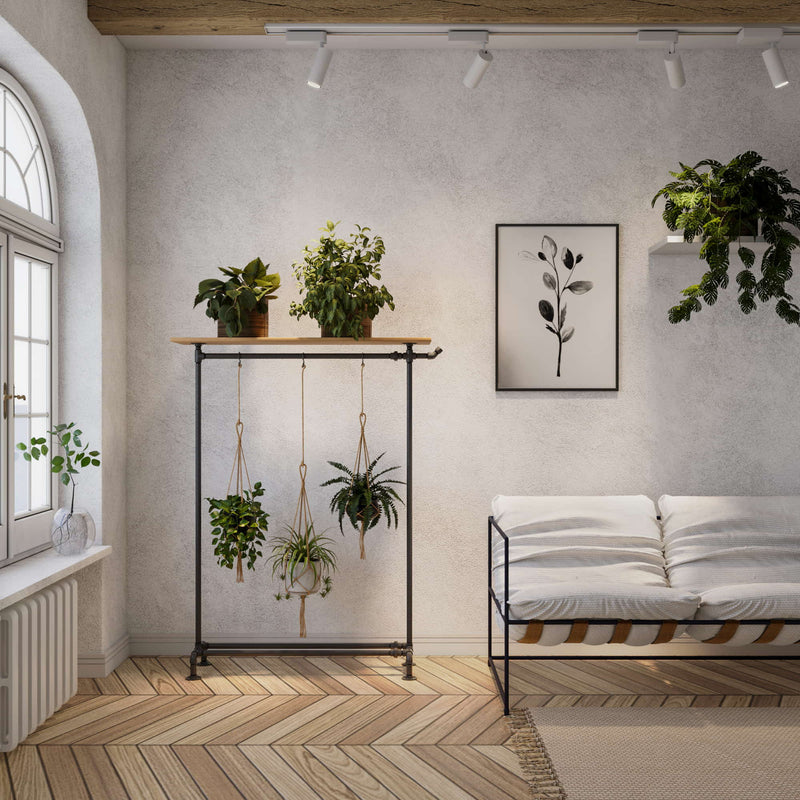 living room design with clothing rack to display plants by hanging them and placing them on shelf on top