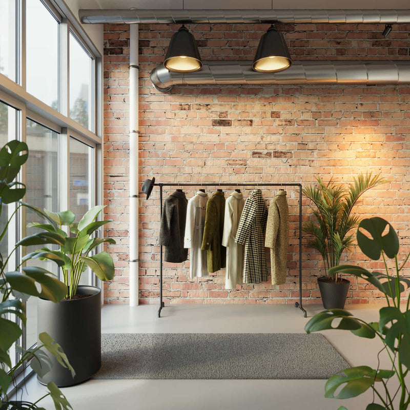 office entrance with industrial clothes rail freestanding for employees and guests jackets